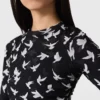 Abito a maniche lunghe in maglia con stampa colombe Abito a maniche lunghe in maglia con stampa colombe