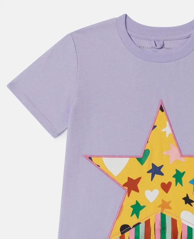 Abito t-shirt con frange e stampa a stelle Abito t-shirt con frange e stampa a stelle