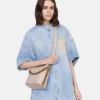 Borsa a secchiello Frayme con borchie e finitura Alter Mat granulosa Borsa a secchiello Frayme con borchie e finitura Alter Mat granulosa