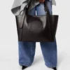 Borsa a tracolla con cintura e logo Borsa a tracolla con cintura e logo