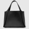 Borsa tote grande con logo e borchie Borsa tote grande con logo e borchie