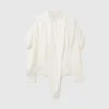 Camicia a maniche lunghe con collo a cravatta e spalline Camicia a maniche lunghe con collo a cravatta e spalline