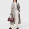 Cappotto lungo doppiopetto in tweed Cappotto lungo doppiopetto in tweed