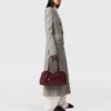 Cappotto lungo doppiopetto in tweed Cappotto lungo doppiopetto in tweed