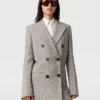 Cappotto lungo doppiopetto in tweed Cappotto lungo doppiopetto in tweed