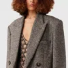 Cappotto lungo doppiopetto in tweed Cappotto lungo doppiopetto in tweed