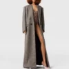 Cappotto lungo doppiopetto in tweed Cappotto lungo doppiopetto in tweed