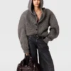 Cardigan con cappuccio a coste Cardigan con cappuccio a coste