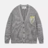 Cardigan in cotone biologico con applicazione a forma di fragola Cardigan in cotone biologico con applicazione a forma di fragola