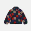 Giacca con zip in pile a scacchi Giacca con zip in pile a scacchi