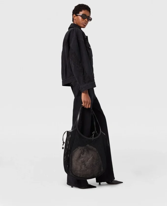Giacca in denim con inserti in pizzo Giacca in denim con inserti in pizzo