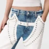 Jeans a gamba dritta con borchie Jeans a gamba dritta con borchie