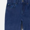 Jeans a gamba dritta con grafica mostruosa Jeans a gamba dritta con grafica mostruosa