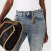 Jeans a zampa svasata con lavaggio vintage Jeans a zampa svasata con lavaggio vintage