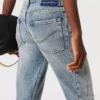 Jeans a zampa svasata con lavaggio vintage Jeans a zampa svasata con lavaggio vintage