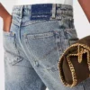 Jeans bootcut con lavaggio vintage Jeans bootcut con lavaggio vintage