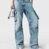Jeans cargo in denim lavato vintage Jeans cargo in denim lavato vintage