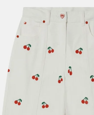 Jeans con ricamo ciliegie
