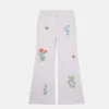 Jeans con ricamo floreale Jeans con ricamo floreale