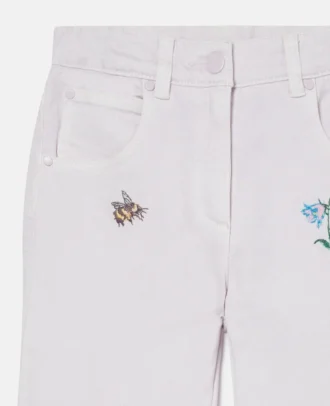 Jeans con ricamo floreale