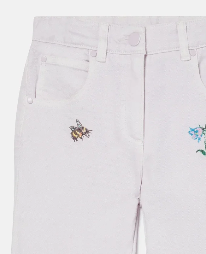 Jeans con ricamo floreale Jeans con ricamo floreale