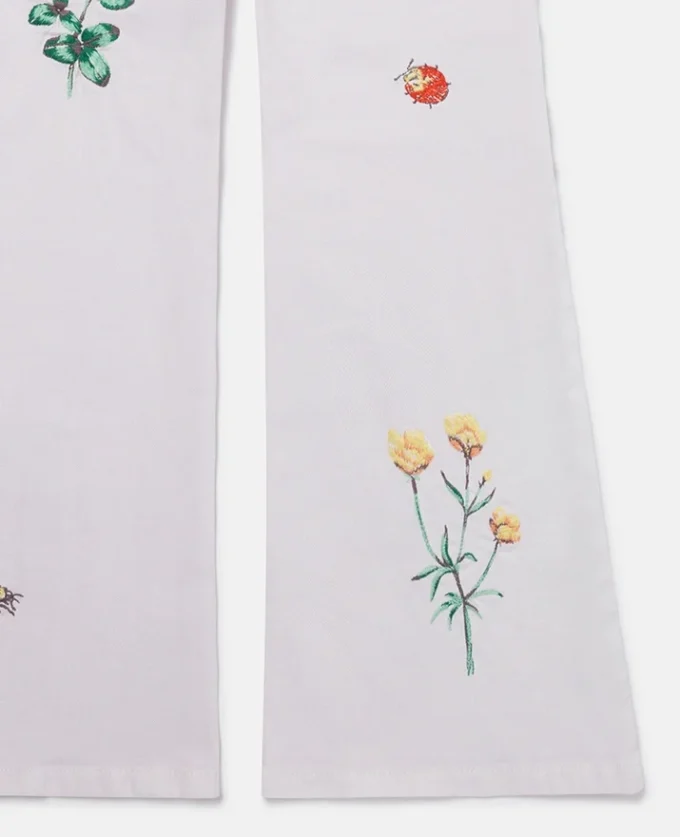 Jeans con ricamo floreale Jeans con ricamo floreale