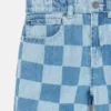 Jeans con stampa a scacchiera