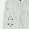 Jeans con stampa skateboard