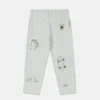 Jeans con stampa skateboard