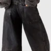Jeans in denim a gamba dritta con finitura cerata Jeans in denim a gamba dritta con finitura cerata
