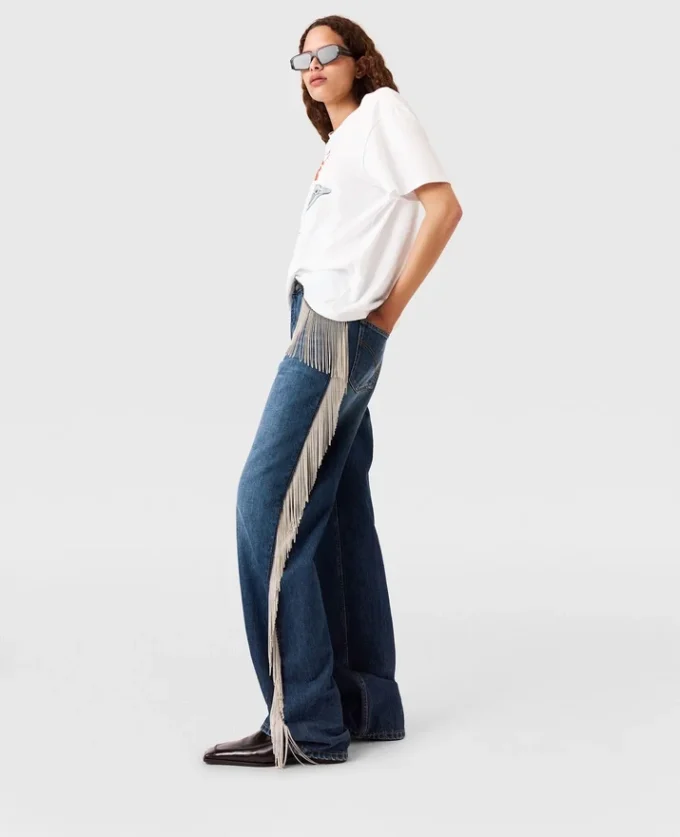 Jeans in denim a gamba dritta con nappine a catena