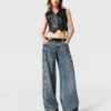 Jeans in denim a gamba larga con lacci Jeans in denim a gamba larga con lacci