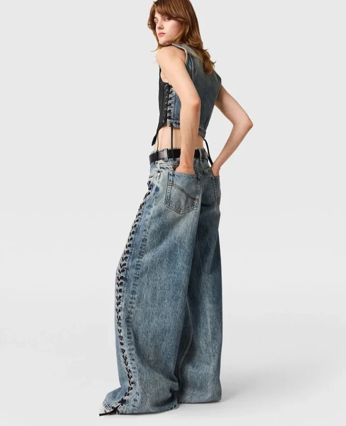 Jeans in denim a gamba larga con lacci Jeans in denim a gamba larga con lacci