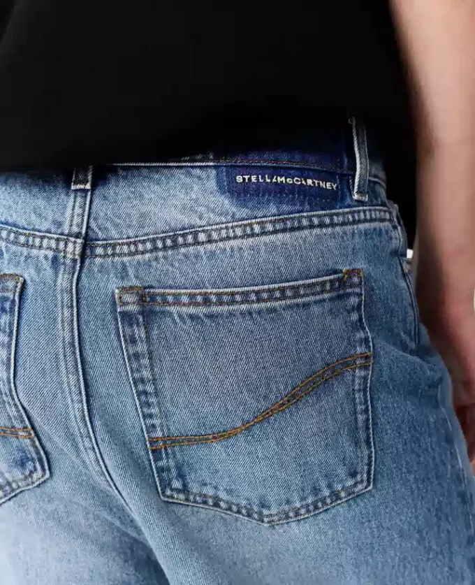 Jeans in denim a vita alta con gamba larga sbiadita Jeans in denim a vita alta con gamba larga sbiadita