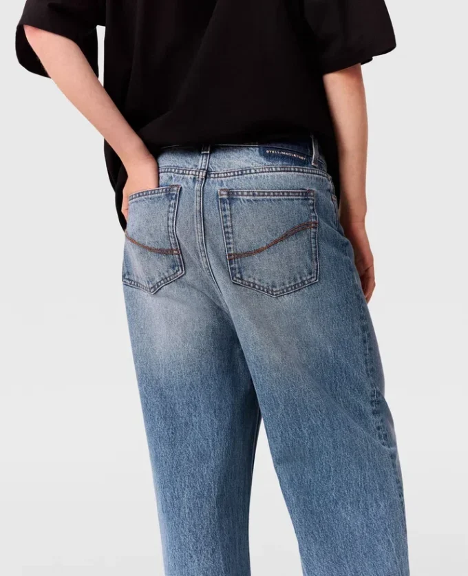 Jeans in denim a vita alta con gamba larga sbiadita Jeans in denim a vita alta con gamba larga sbiadita