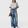 Jeans in denim a vita alta con gamba larga sbiadita Jeans in denim a vita alta con gamba larga sbiadita