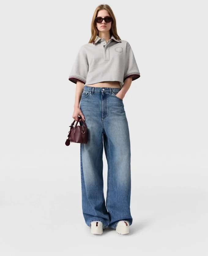 Jeans in denim a vita alta con gamba larga sbiadita Jeans in denim a vita alta con gamba larga sbiadita