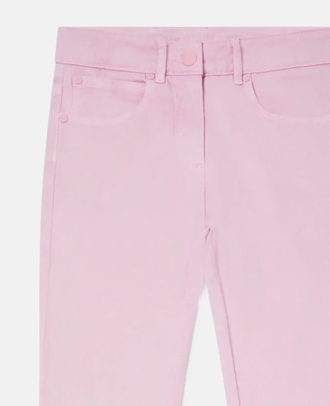 Jeans in denim con bordi smerlati Jeans in denim con bordi smerlati
