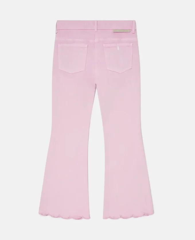 Jeans in denim con bordi smerlati Jeans in denim con bordi smerlati