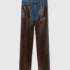 Jeans in denim con inserti in pelle di serpente Jeans in denim con inserti in pelle di serpente