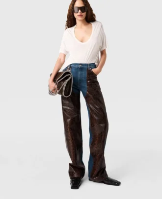 Jeans in denim con inserti in pelle di serpente