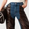 Jeans in denim con inserti in pelle di serpente Jeans in denim con inserti in pelle di serpente