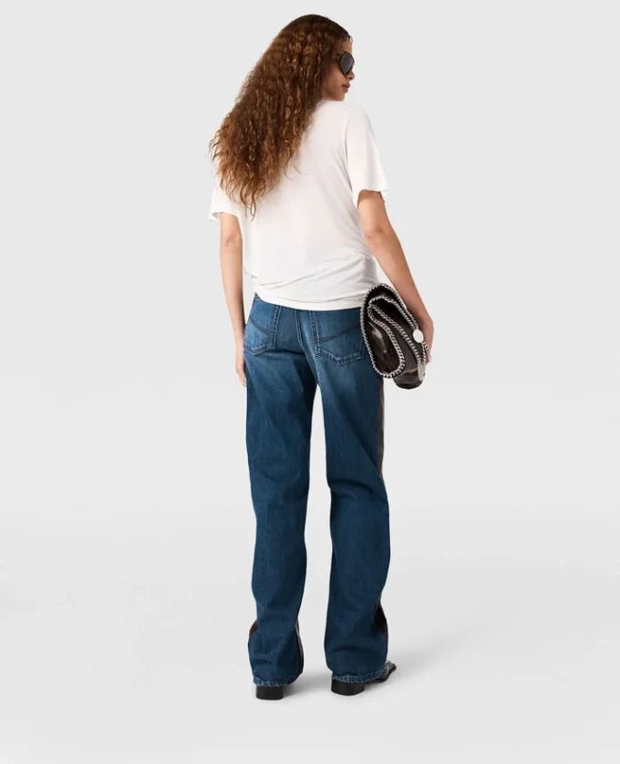 Jeans in denim con inserti in pelle di serpente Jeans in denim con inserti in pelle di serpente