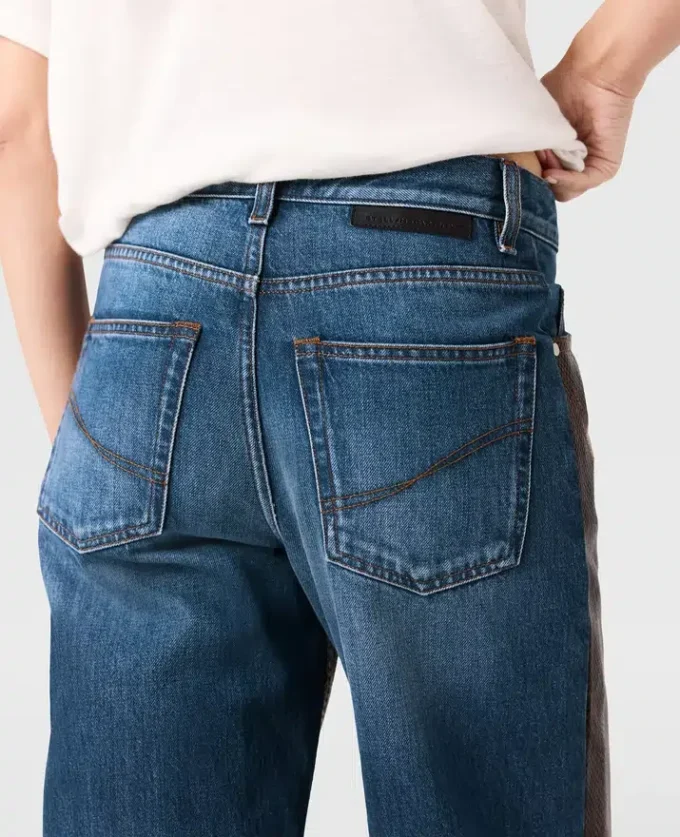 Jeans in denim con inserti in pelle di serpente Jeans in denim con inserti in pelle di serpente