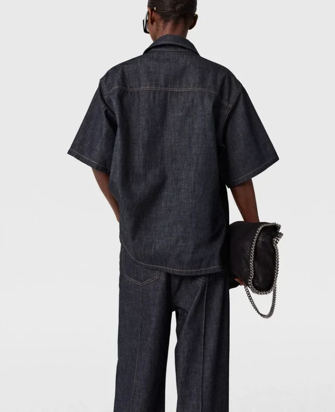 Jeans in denim con pannelli in raso a gamba larga Jeans in denim con pannelli in raso a gamba larga