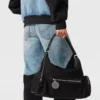 Jeans in denim con pannelli patchwork Jeans in denim con pannelli patchwork