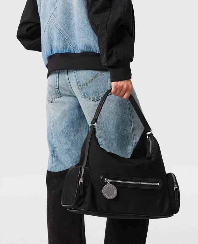 Jeans in denim con pannelli patchwork Jeans in denim con pannelli patchwork