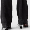 Jeans in denim con pannelli patchwork Jeans in denim con pannelli patchwork