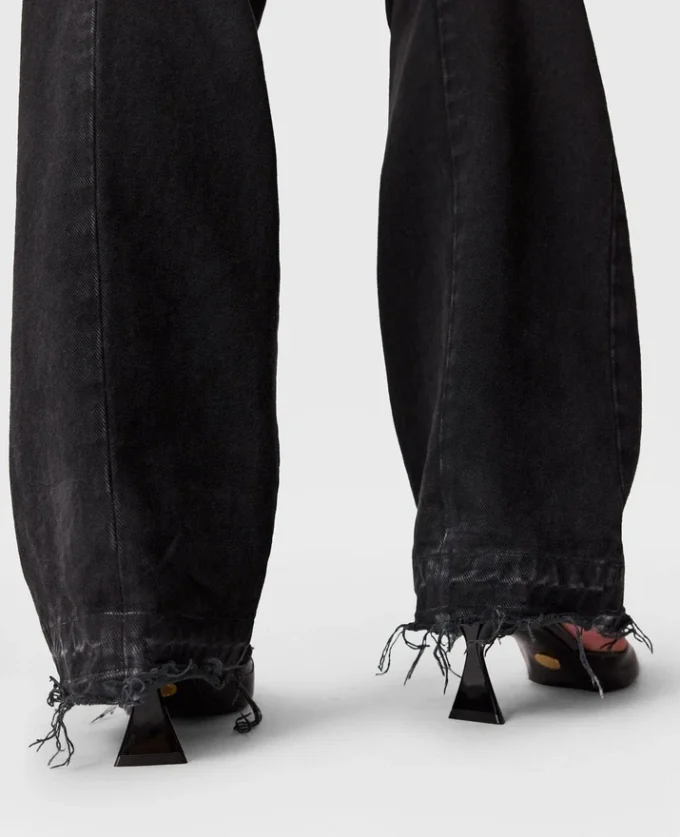 Jeans in denim con pannelli patchwork Jeans in denim con pannelli patchwork