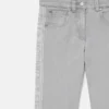 Jeans in denim con pannello con marchio Jeans in denim con pannello con marchio